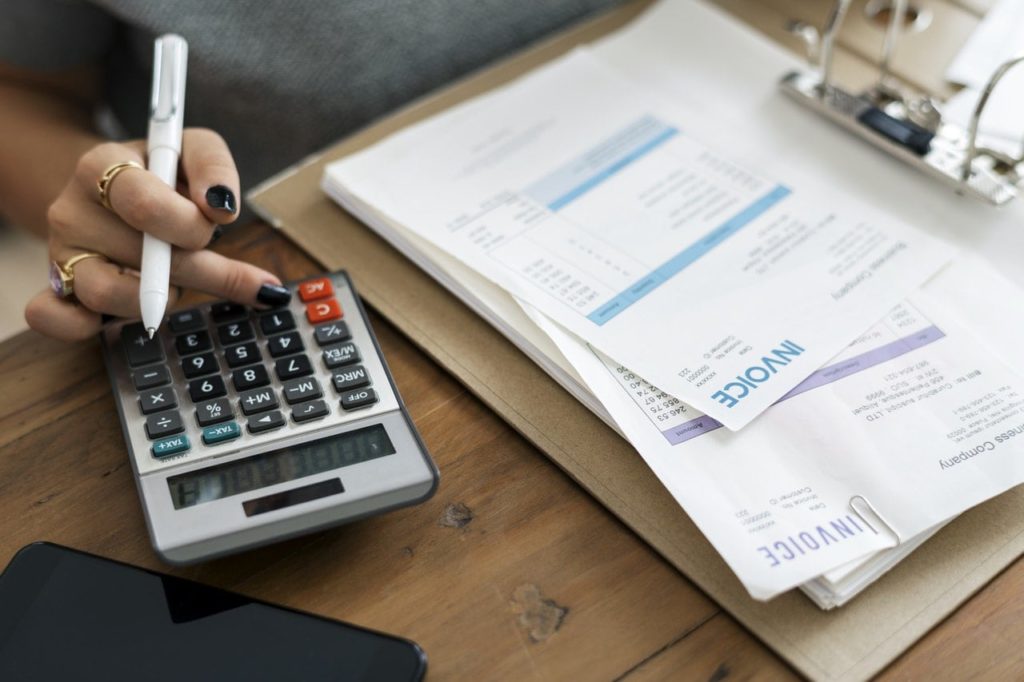 Woman calculating bills