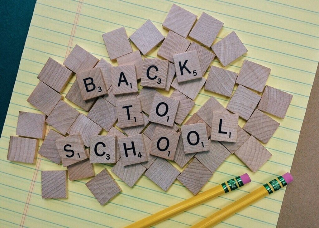 Back to school spelt out with scrabble pieces