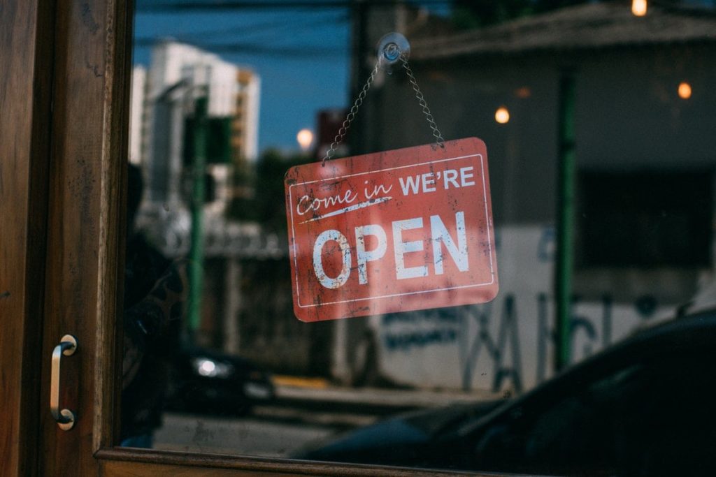 Glass door with open sign