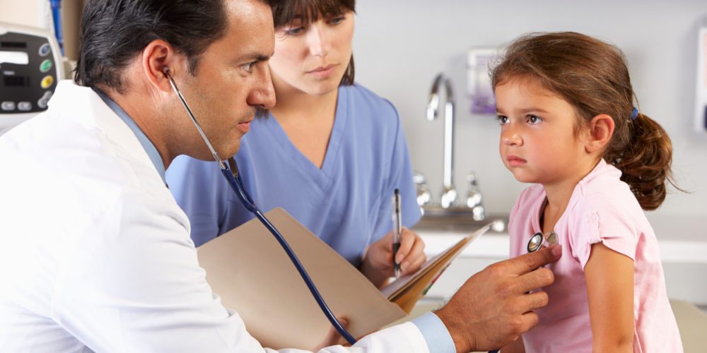 Girl getting medical exam