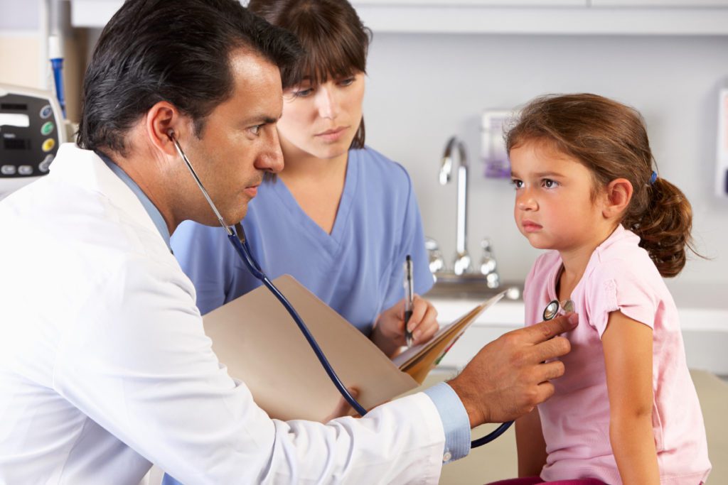 Girl getting medical exam