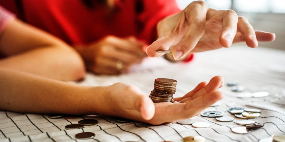 Woman counting coins